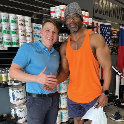 5 Star employee posing with a customer