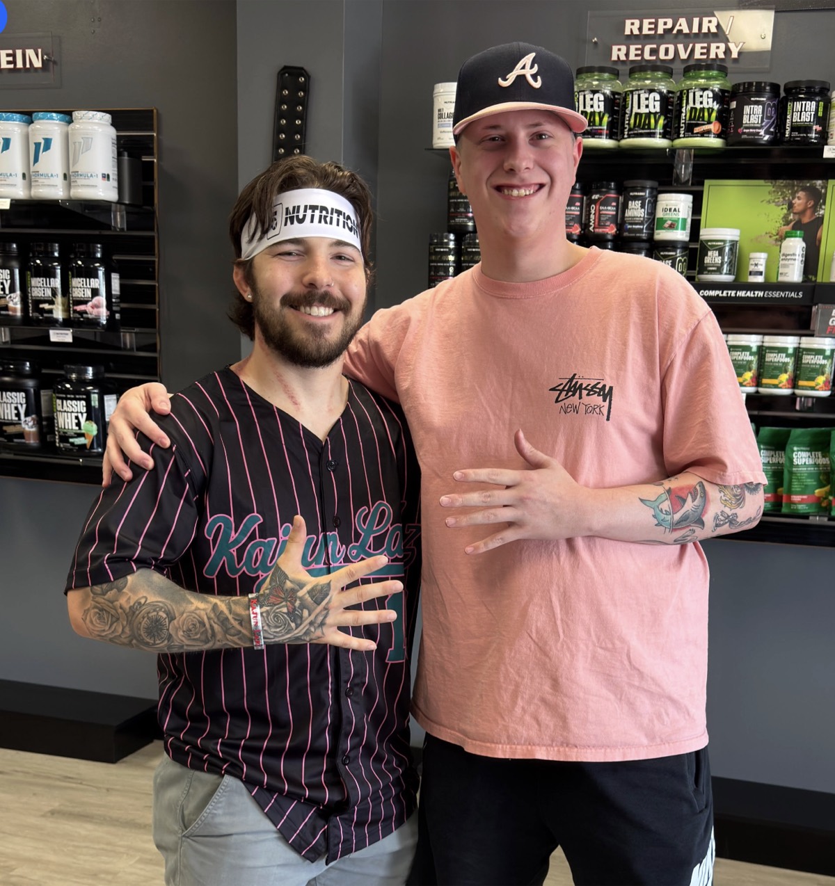 5 Star customers posing together in a store