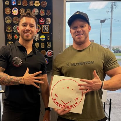 5 Star employee posing with a crossfit employee