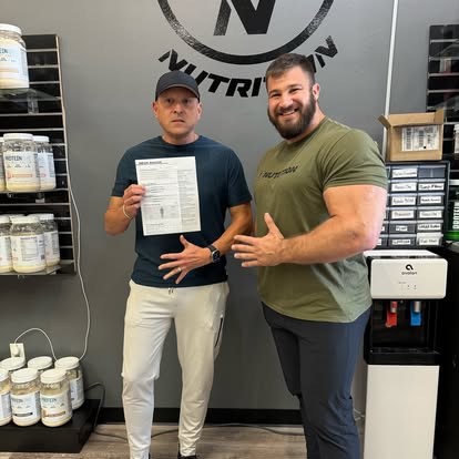 5 Star employee posing with a customer